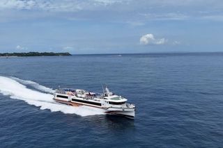D'Camel fast ferry under way off the coast
