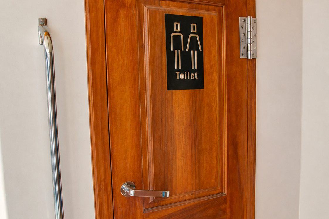 Onboard toilet door, signposted inside the cabin