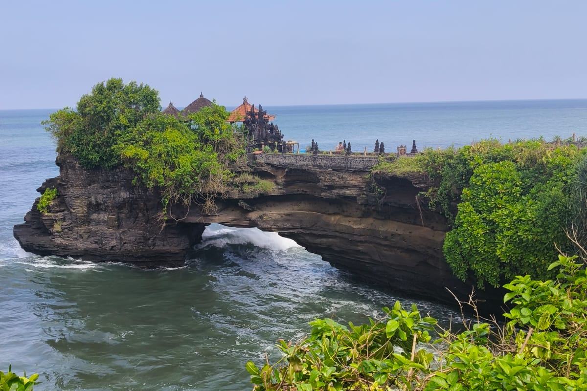 Tanah Lot temple on its rock at the water's edge